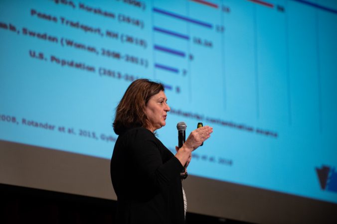 Dr. Sharon Watkins, from the Pennsylvania Department of Health, compares PFAS findings in Fort Washinton to results found in other studies throughout the US and world. (Kriston Jae Bethel for WHYY)