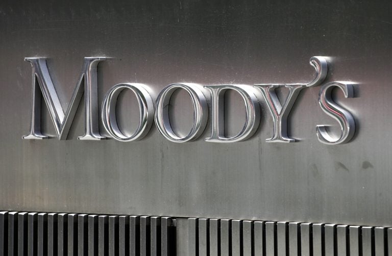 A sign for Moody's Corp. is shown Aug. 13, 2010 in New York. Moody's Investors Service is a credit rating agency. (AP Photo/Mark Lennihan)