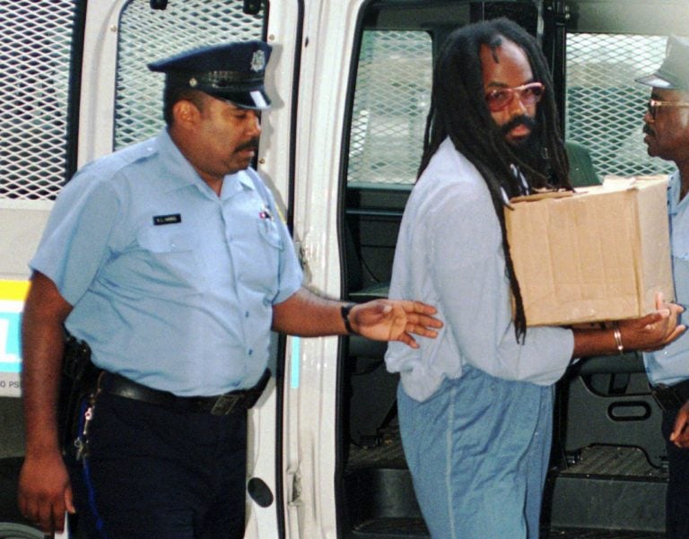 In this July 25, 1995 file photo, Mumia Abu-Jamal, convicted of killing a policeman, arrives at Philadelphia's City Hall.  (Nanine Hartzenbusch/AP Photo, File)