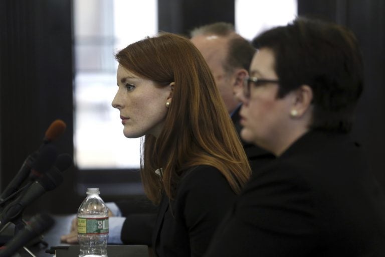 FILE: Katie Brennan, (left), then-chief of staff at the New Jersey Housing and Mortgage Finance Agency, listens to a question as she testifies before the Select Oversight Committee at the Statehouse, Tuesday, Dec. 4, 2018, in Trenton, N.J.  (Mel Evans/AP Photo)