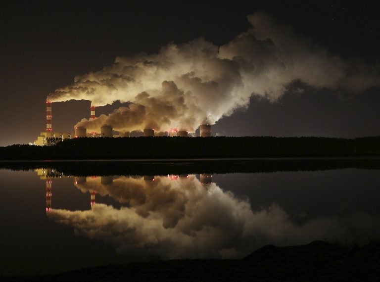 In this Wednesday, Nov. 28, 2018 file photo, plumes of smoke rise from Europe's largest lignite power plant in Belchatow, central Poland. After several years of little growth, global emissions of heat-trapping carbon dioxide surged in 2018 with the largest jump in seven years, discouraged scientists announced Wednesday, Dec. 5, 2018. (Czarek Sokolowski/AP Photo)