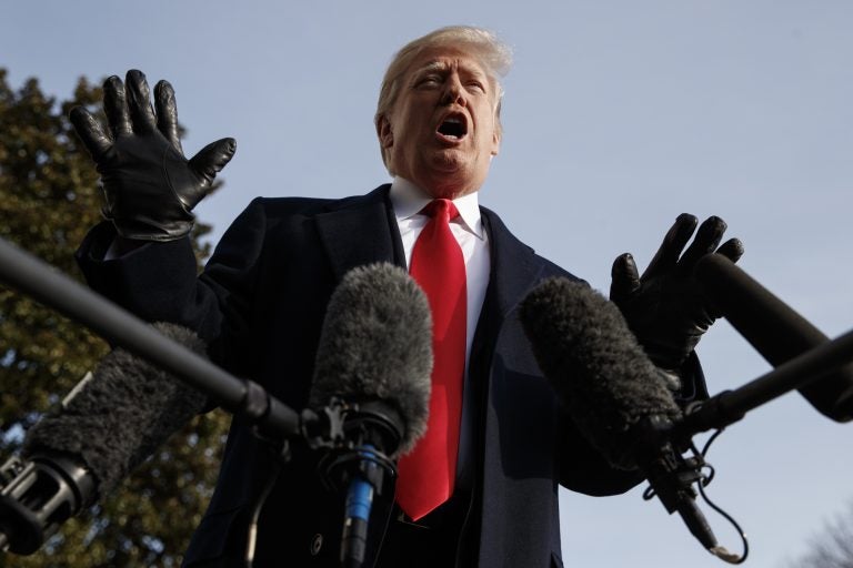 President Donald Trump talks to media before boarding Marine One on the South Lawn of the White House in Washington, Saturday, Dec. 8, 2018, for the short trip to Andrews Air Force Base en route to Philadelphia to attend the Army-Navy Football Game. (Carolyn Kaster/AP)