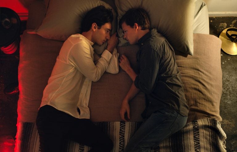 This image released by Focus Features shows Theodore Pellerin, (left), and Lucas Hedges in a scene from 