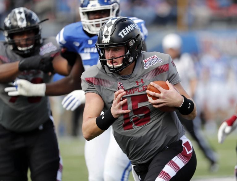Temple quarterback Anthony Russo (15) runs for a short gain against Duke during the first half of the Independence Bowl, an NCAA college football game, in Shreveport, Louisiana, Thursday. (AP Photo/Rogelio V. Solis)