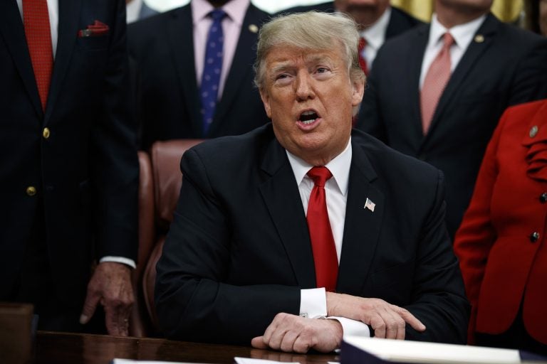 In this Friday, Dec. 21, 2018 file photo, President Donald Trump makes a statement on the possible government shutdown before signing criminal just reform legislation in the Oval Office of the White House, in Washington. Nancy Pelosi and Trump both think they have public sentiment on their side in the battle over a border wall. That theory will be put the test this week when the new House Democratic majority led by Pelosi gavels into session with legislation to end the government shutdown. (AP Photo/Evan Vucci, File)