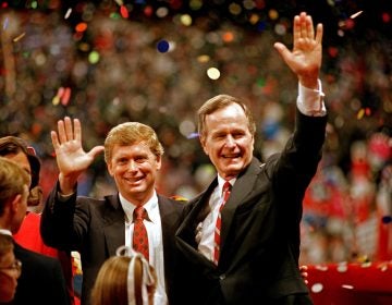 FILE - In this Aug. 18, 1988 file photo, Republican presidential candidate, Vice President George H.W. Bush,  right, and his running mate Sen. Dan Quayle, R-Ind., wave to the assembly of the Republican National Convention in New Orleans after their acceptance speeches for the presidential and vice-presidential nomination.  (AP Photo/J. Scott Applewhite, File)