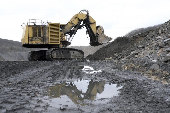 An excavator works on a ridge at the the Blaschak Coal Corporation pit mine Dec. 4, 2018, in Mount Carmel, Pennsylvania. (Matt Smith for Keystone Crossroads)