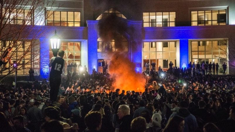 Villanova students celebrate the men's basketball team victory in the NCAA championship on April 2, 2018. (Branden Eastwood for WHYY)