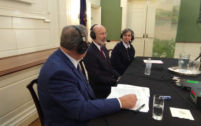 (From left) WITF Smart Talk host Scott LaMar speaks with Gov. Tom Wolf and first lady Frances Wolf during a live broadcast from the Governors Residence in Harrisburg on Dec. 7, 2018. (Lisa Wardle/WITF)