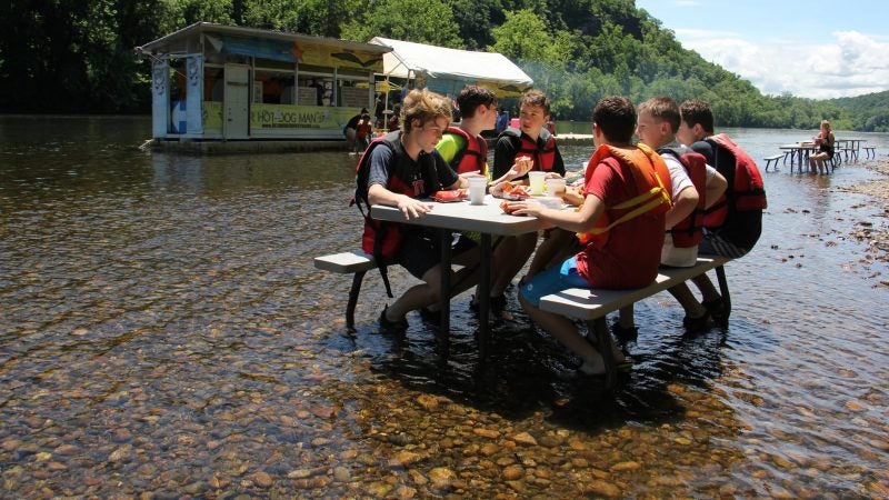 Located in a remote spot on the Delaware River tubing route, the Famous River Hot Dog Man is the only game in town for tubers, whose lazy journeys can last four to six hours. (Emma Lee/WHYY)