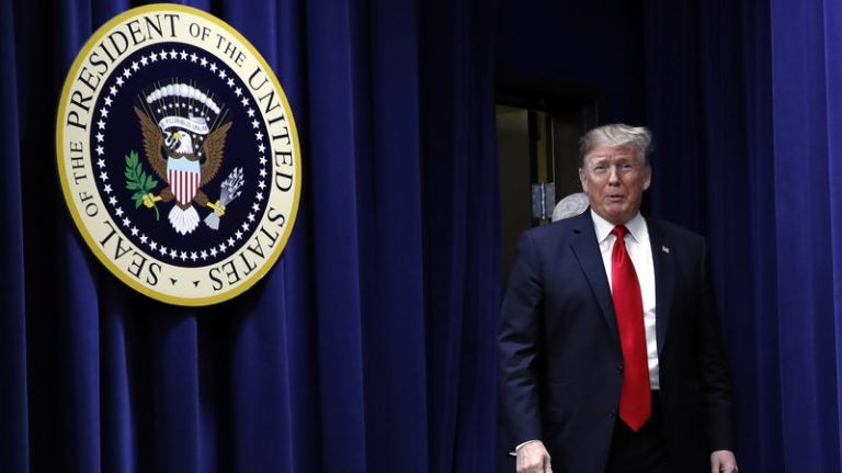 President Trump arrives to speak at a signing ceremony for HR 2, the Agriculture Improvement Act of 2018, at the Executive Office Building on Thursday. (Jacquelyn Martin/AP)