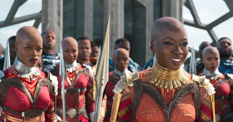 Ayo (Florence Kasumba, left) and Okoye (Danai Gurira) are members of the Dora Milaje, the elite female warriors of Wakanda, in Black Panther.</em