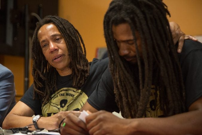 MOVE member Debbie Africa makes her first public appearance since being released from prison after 39 years and 10 months of incarceration on June 19, 2018. She is joined by her son, Michael Africa Jr., whom she gave birth to while incarcerated.  (Emily Cohen for WHYY)