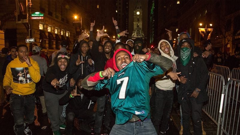 Fans celebrate in the streets of Philadelphia after the Eagles win the Super Bowl on Feb. 4, 2018. (Emily Cohen for WHYY)