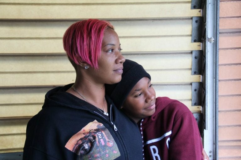 Collette Williams and her son SaVaughn, 13, live a few blocks from the Clairton Coke Works. (Reid R. Frazier/StateImpact Pennsylvania)