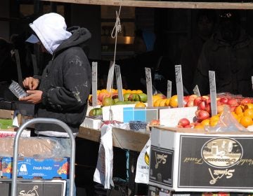 A fruit vendor in the Italian Market (David Swift Photography/ EOTS Flickr Group)