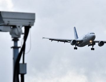 A jet lands at London Gatwick Airport on Friday. The airport had been closed for over a day after a drone repeatedly flew nearby. (Ben Stansall/AFP/Getty Images)