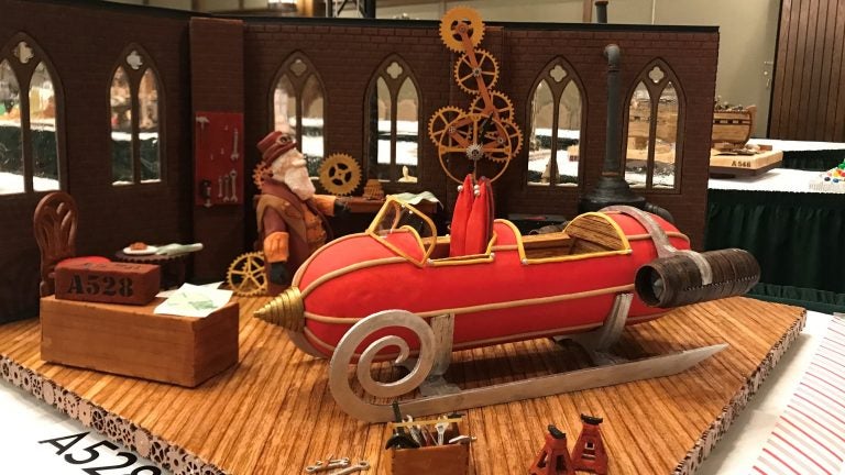 For this year's grand prize winner, the judges were impressed by the intricate, working gingerbread gears of the clock inside Santa's workshop. (Kristen Hartke/NPR)