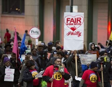 Fast food and retail workers and their supporters marched through Center City to kick off the fight for 