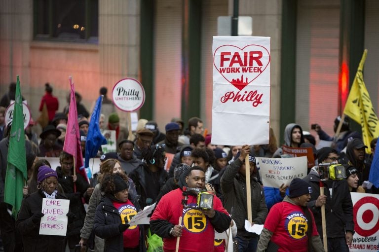 Fast food and retail workers and their supporters marched through Center City to kick off the fight for 