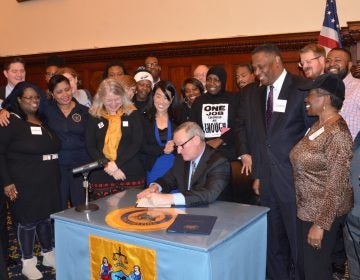 Mayor Kenney signs bills at City Hall (Tom MacDonald/WHYY)