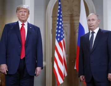 U.S. President Donald Trump, left, and Russian President Vladimir Putin pose for a photograph at the beginning of a one-on-one meeting at the Presidential Palace in Helsinki, Finland, Monday, July 16, 2018. (Pablo Martinez Monsivais/AP Photo)