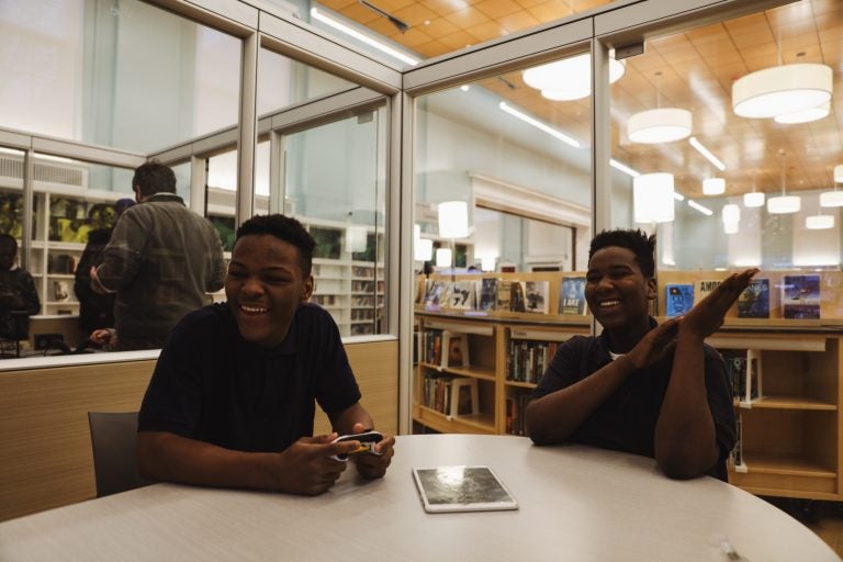 Shyeer Johnson and Waki Perry, both 14, frequent the library after school. (Neal Santos for PlanPhilly)