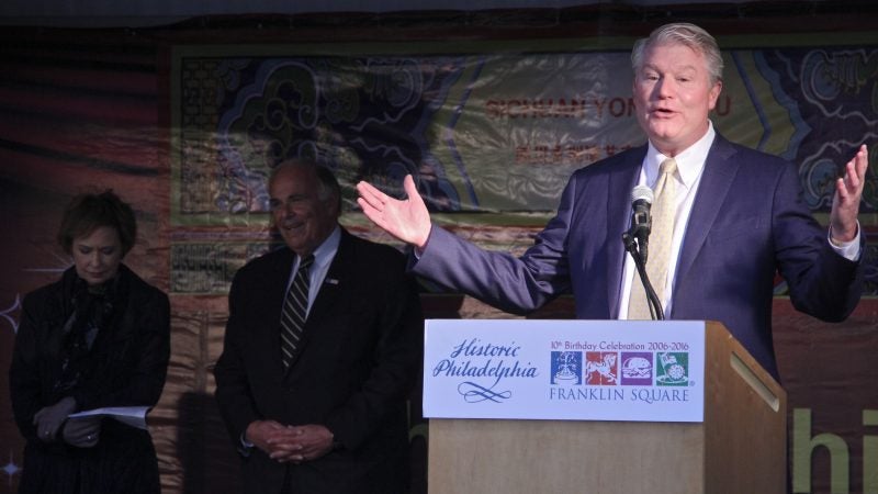 Labor leader John Dougherty shares the stage with former Gov. Ed Rendell during opening ceremonies for the Chinese Lantern Festival on April 21, 2016. Dougherty's union, the Internation Brotherhood of Electrical Workers Local 98 helps to support the event. (Emma Lee/WHYY)