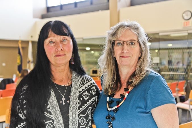 Ann Remy (right), is of Lenape descent, and Donna Fann-Boyle (left) is of Cherokee descent. Fann-Boyle is testifying at public hearing in Bucks County about the Neshaminy School District mascot. (Kimberly Paynter)