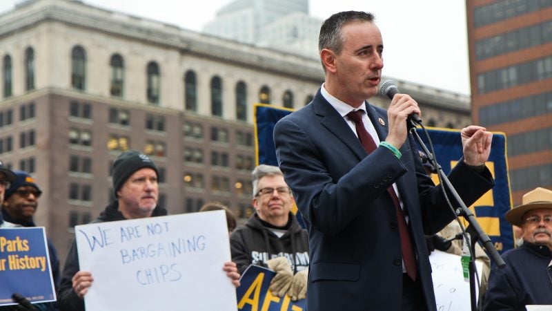 Republican Congressman Brian Fitzpatrick calls for an end to the government shutdown at a rally on Independence Mall Tuesday. (Kimberly Paynter/WHYY)