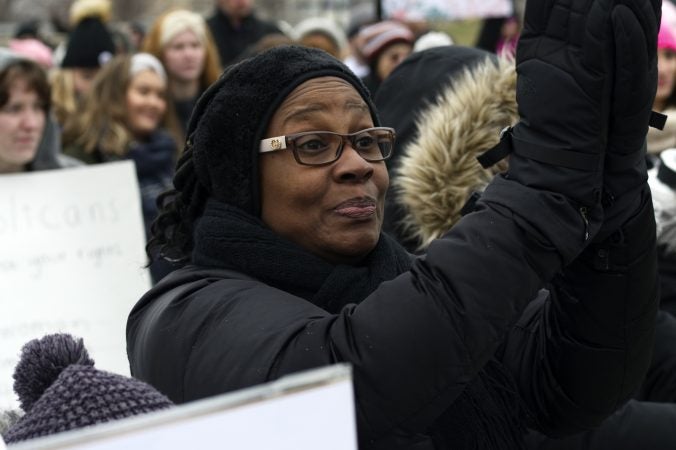 The audience listens to speakers on stage during the 2019 Women's March on the Benjamin Franklin Parkway, in Philadelphia, Pa. (Bastiaan Slabbers for WHYY)