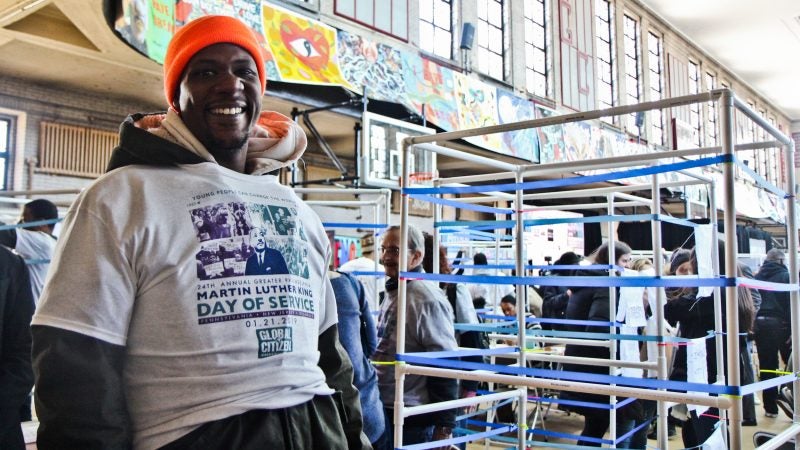 Michael Cogbill is an anti-violence activist involved with the Dream Booth banner project which will placed the booths in almost every city school. (Kimberly Paynter/WHYY)