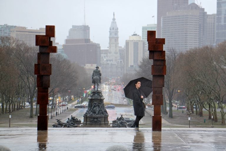 A visitor to the Philadelphia Museum of Art inspects the sculpture series, 