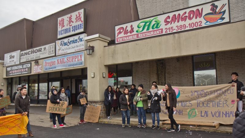 Members and supporters of Philadelphia’s Southeastern Asian community protest deportations at a shopping center on West Oregon Avenue on Sunday, Jan. 27, 2019. (Kimberly Paynter/WHYY)