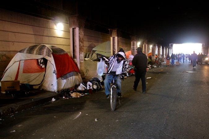Some residents of the Emerald Street encampment agreed to go into treatment programs or shelters, while others simply took up their possessions and left. (Emma Lee/WHYY)
