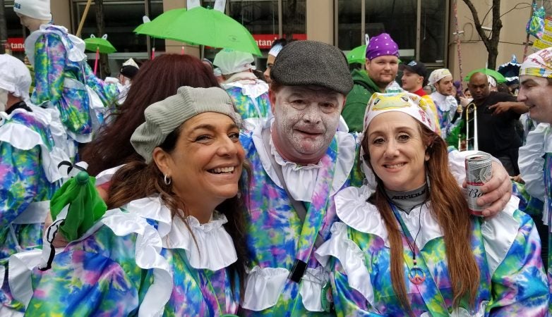 Laura Galdo, right is marching with the Froggy Car Comics in 2019 Mummers parade. It's her first time in the parade. (Tom MacDonald/WHYY)