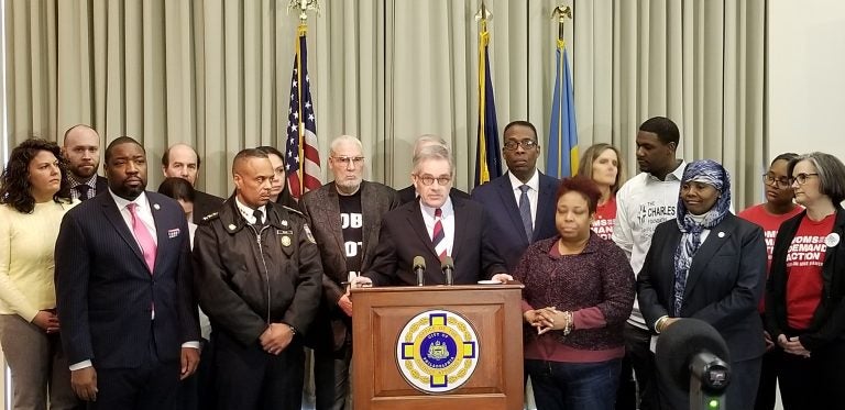 Philadelphia District Attorney Larry Krasner announces his intention to enforce a 2009 city law that mandates gun owners report a weapon's loss or theft to police. The National Rifle Association is taking issue with that move. (Tom MacDonald/ WHYY)