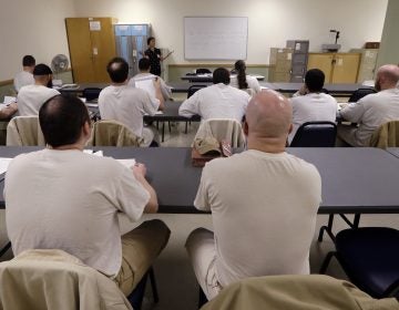 In this photo taken Thursday, Jan. 28, 2016, inmates look on in their college world history class at the Monroe Correctional Complex in Monroe, Wash. College education in American prisons is starting to grow again, more than two decades since federal government dollars were prohibited from being used for college programs behind bars. (Elaine Thompson/AP Photo)