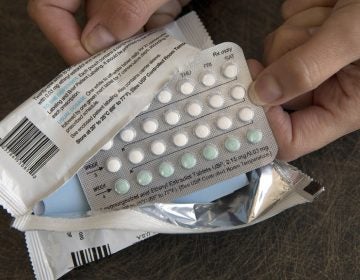 In this Aug. 26, 2016, file photo, a one-month dosage of hormonal birth control pills is displayed in Sacramento, Calif. (AP Photo/Rich Pedroncelli)