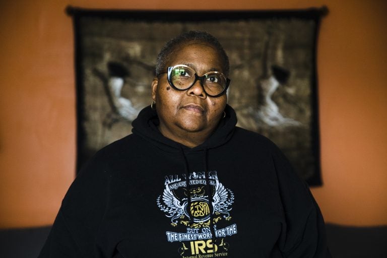 Nora Brooks a furloughed customer service representative for the Internal Revenue Service poses for a photograph at her home in Philadelphia, Thursday, Jan. 3, 2019. (Matt Rourke/AP Photo)