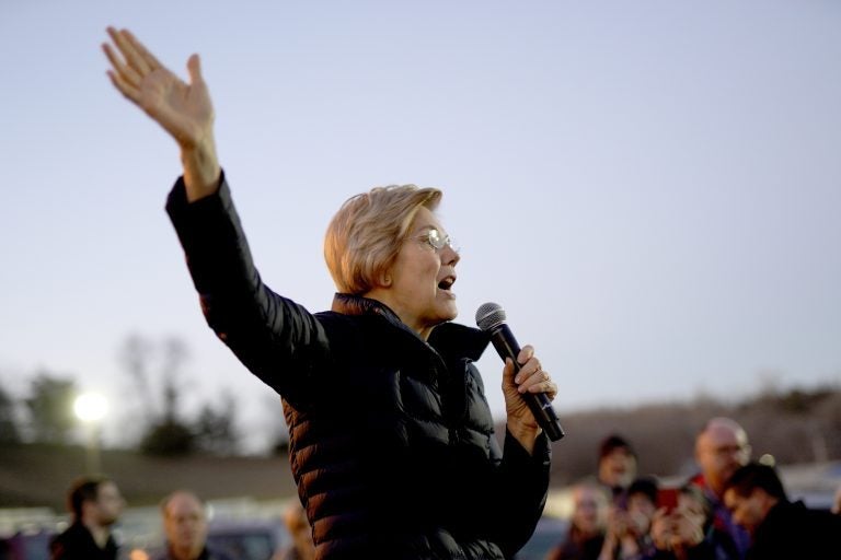 Sen. Elizabeth Warren, D-Mass, addresses an overflow crowd outside an organizing event at McCoy's Bar Patio and Grill in Council Bluffs, Iowa, Friday, Jan. 4, 2019. (Nati Harnik/AP Photo)