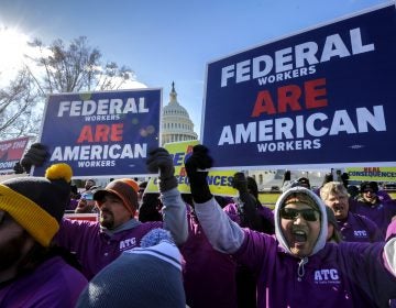 On the 20th day of a partial government shutdown, federal employees rally at the Capitol to protest the impasse between Congress and President Donald Trump over his demand to fund a U.S.-Mexico border wall, in Washington, Thursday, Jan. 10, 2019. (AP Photo/J. Scott Applewhite)