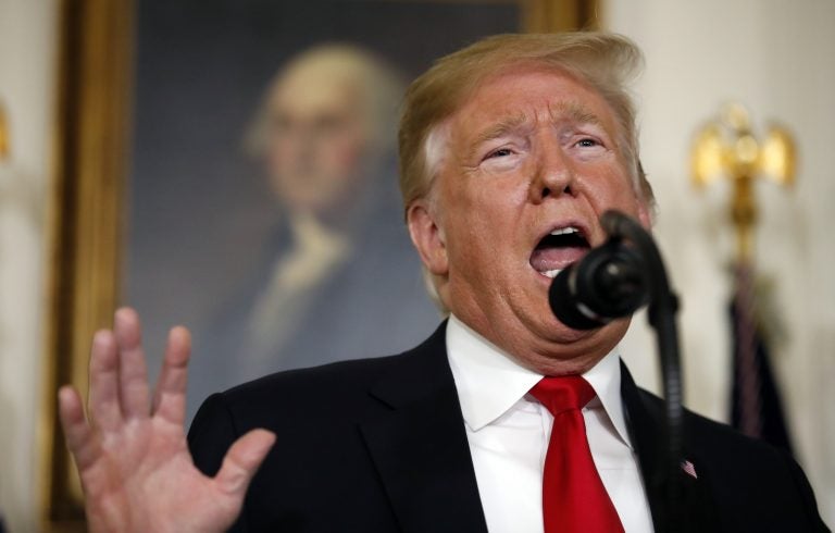 President Trump speaks about the partial government shutdown, immigration and border security in the Diplomatic Reception Room of the White House Saturday.
(Alex Brandon/AP)