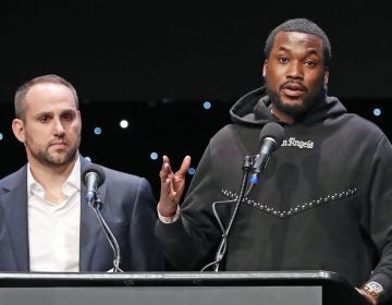 Recording artist Meek Mill, right, speaks about his incarceration along with Philadelphia 76ers co-owner and Fanatics executive chairman Michael Rubin at the launch of REFORM Alliance, a partnership among entertainment moguls, entrepreneurs, recording artists, and business and sports leaders who hope to transform the American criminal justice system, Wednesday, Jan. 23, 2019, in New York. (Kathy Willens/AP Photo)