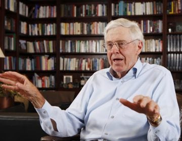 In this photo May 22, 2012 file photo, Charles Koch speaks in his office at Koch Industries in Wichita, Kan. Hundreds of wealthy donors gathered by billionaire industrialist Charles Koch will be meeting this weekend of Jan. 26, 2019, for the first time since the influential conservative political network announced it won't spend any money on the 2020 presidential race. (Bo Rader/The Wichita Eagle via AP, File)