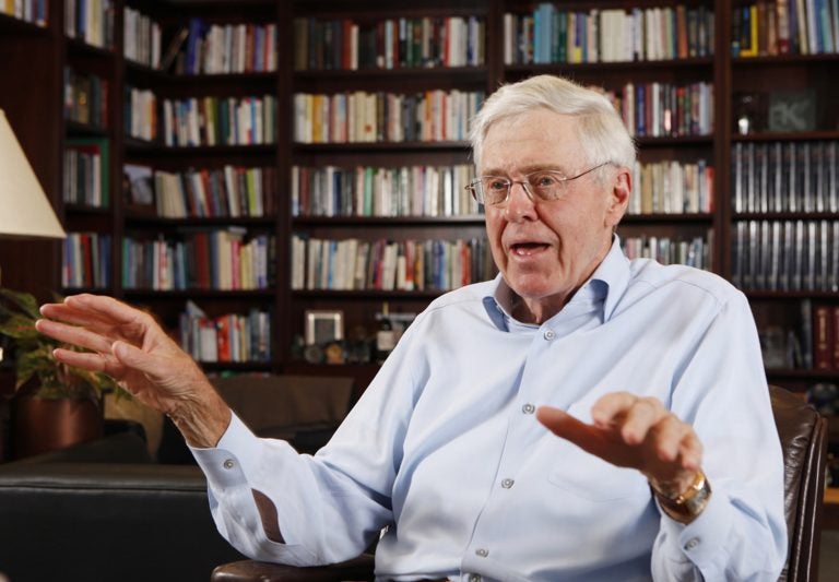 In this photo May 22, 2012 file photo, Charles Koch speaks in his office at Koch Industries in Wichita, Kan. Hundreds of wealthy donors gathered by billionaire industrialist Charles Koch will be meeting this weekend of Jan. 26, 2019, for the first time since the influential conservative political network announced it won't spend any money on the 2020 presidential race. (Bo Rader/The Wichita Eagle via AP, File)