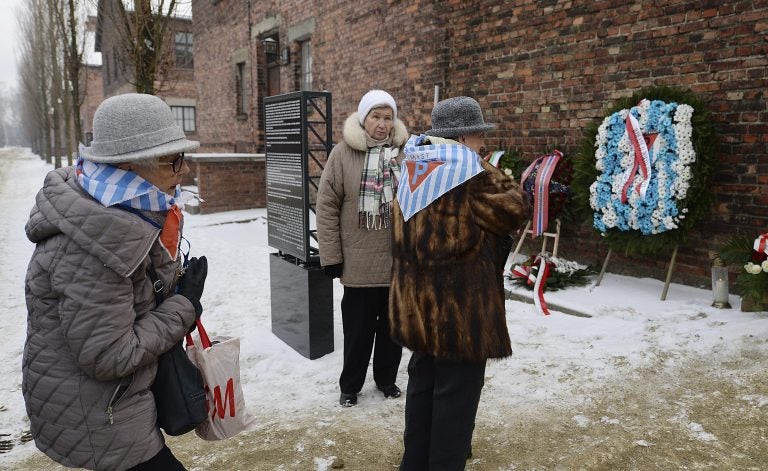 Former prisoners and their guests arrive for the ceremony marking the 74th anniversary of the liberation of KL Auschwitz-Birkenau, in Oswiecim, Poland, Sunday, Jan. 27, 2019.(AP Photo/Czarek Sokolowski)