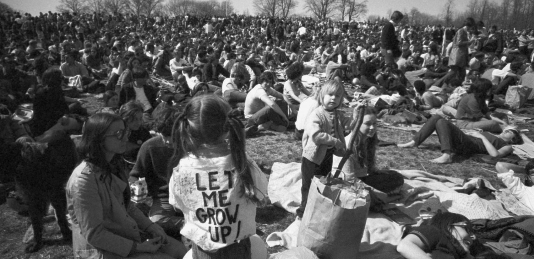 Earth Week crowd in Philadelphia, including a young girl wearing a 