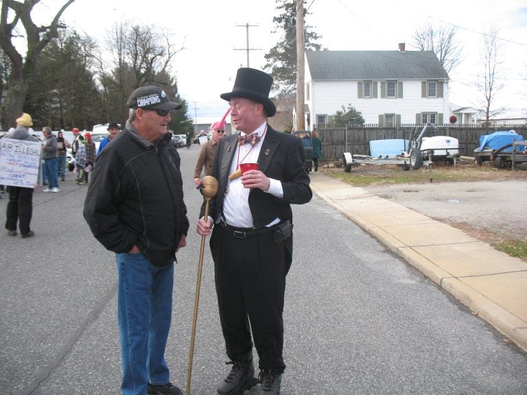 Jack Schreppler, the 'disorganizer' of the Hummers parade, stands at the corner of Cass and Cochran in Middletown, Delaware, where the parade began in 1971. (John Mussoni/WHYY)