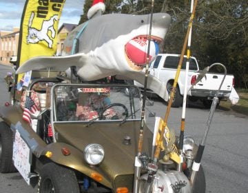 Art Wilson of Clayton is in his first parade. He was proud to show off his dune buggy. The shark was autographed by Bruce Meyers, the creator of the dune buggy. (John Mussoni/WHYY)